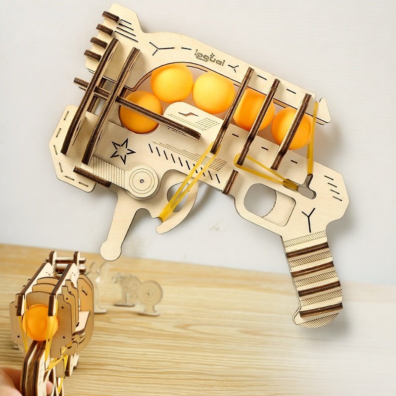 Table Tennis Gun - Pistolet à élastiques en bois à